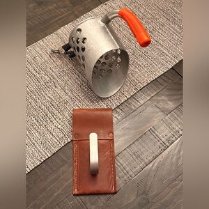Handmade hand stitched quality leather metal detecting hand held scoop holder.